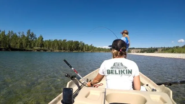 Bent fishing pole on flathead river
